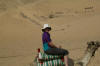 tara on camel in the desert